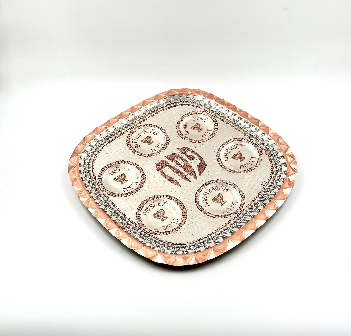 A unique handmade copper and silver Passover plate by David Miro