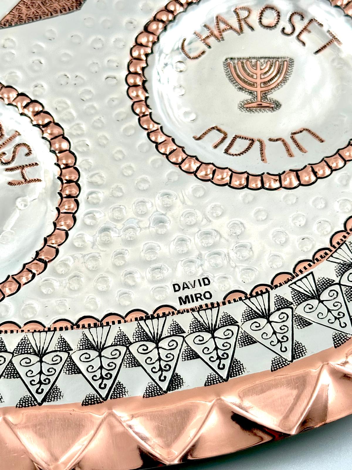 A unique handmade copper and silver Passover plate by David Miro