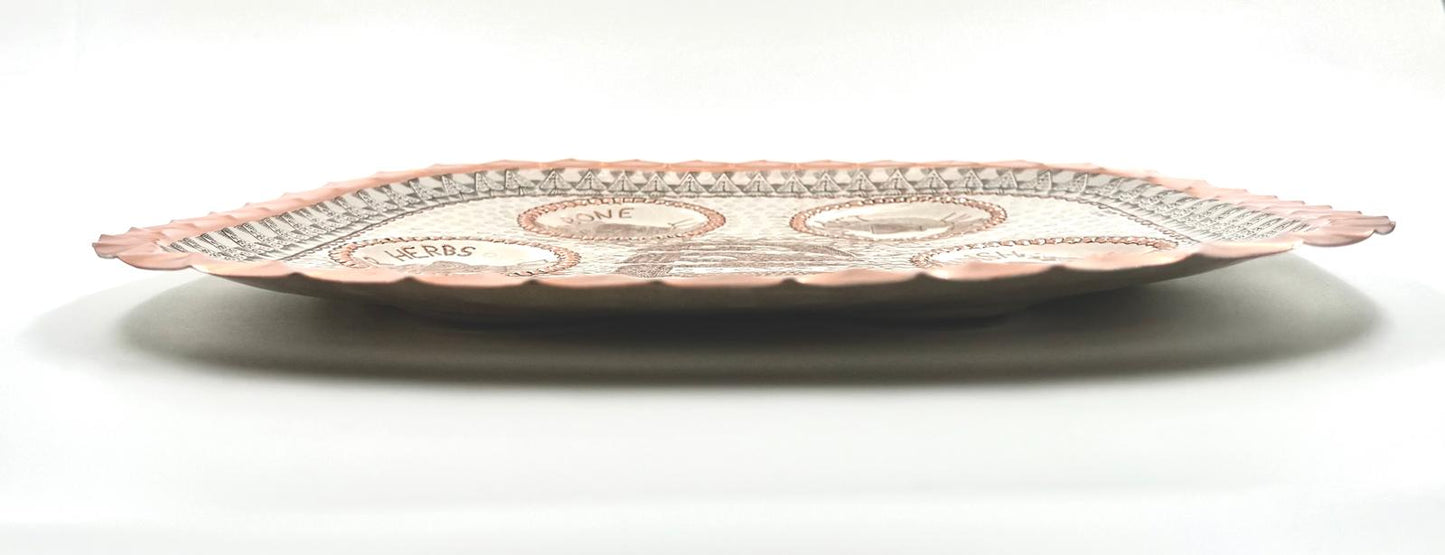 A unique handmade copper and silver Passover plate by David Miro