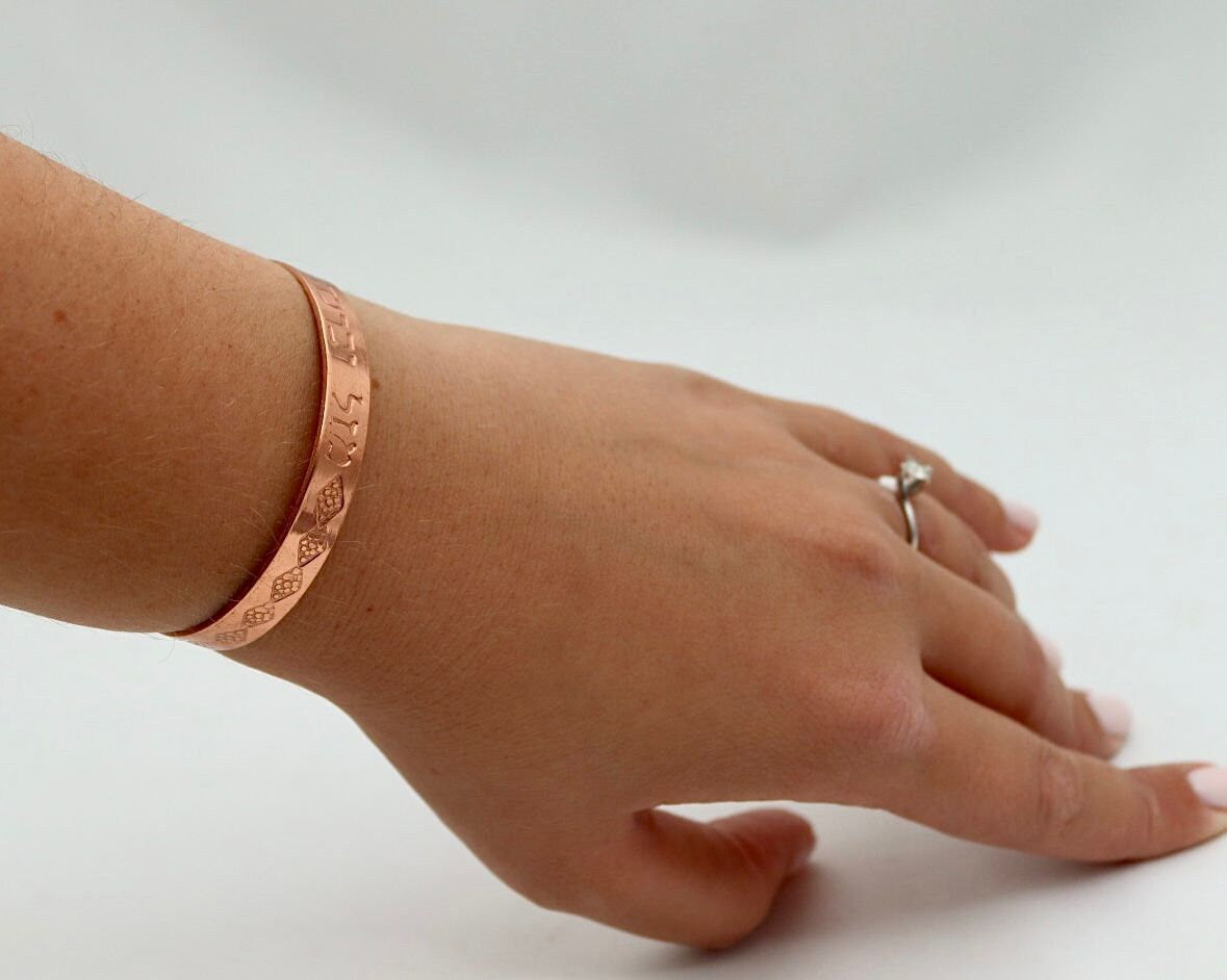 copper bracelet engraved "luck and blessing" in Hebrew