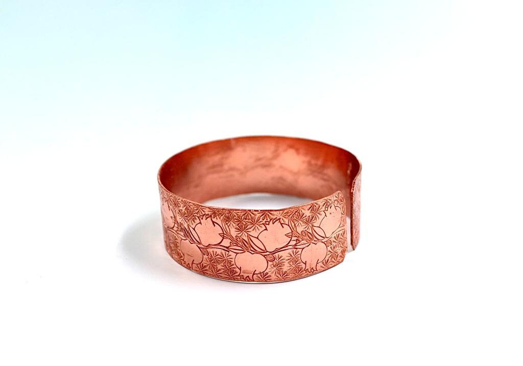 copper bracelet with pomegranates