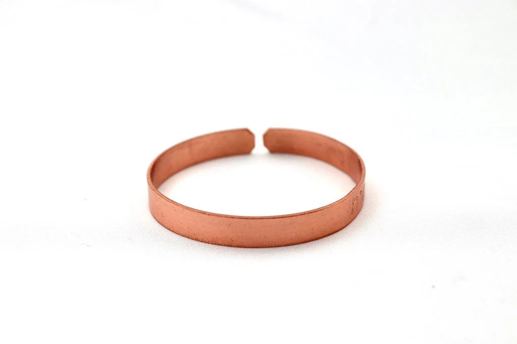 copper bracelet engraved "Only in happiness" in Hebrew