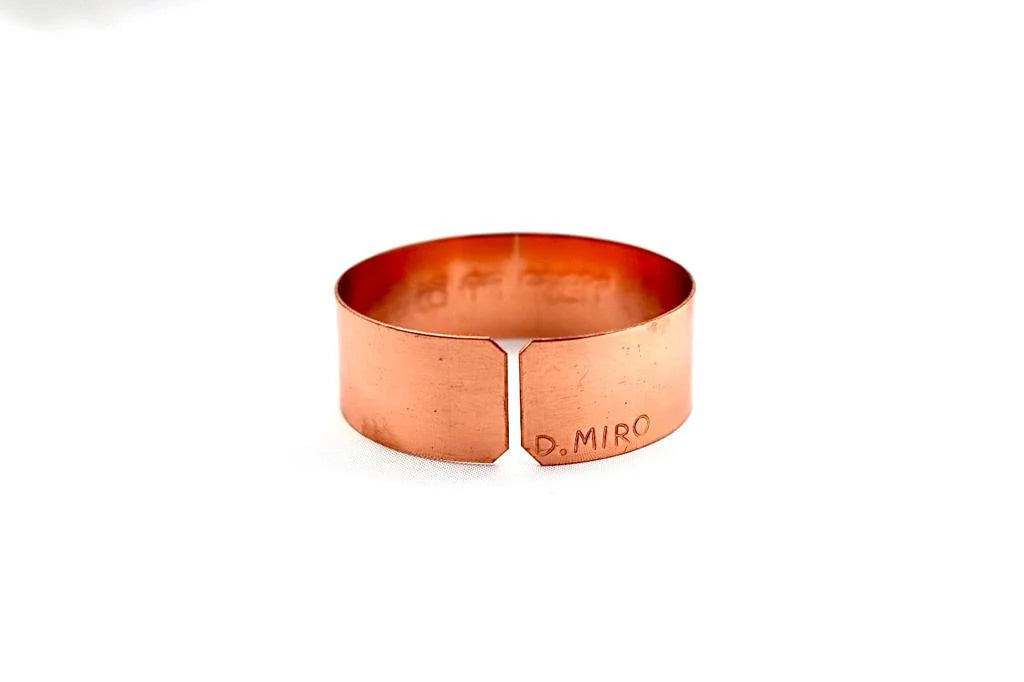 copper bracelet engraved :"This too shall pass" in Hebrew