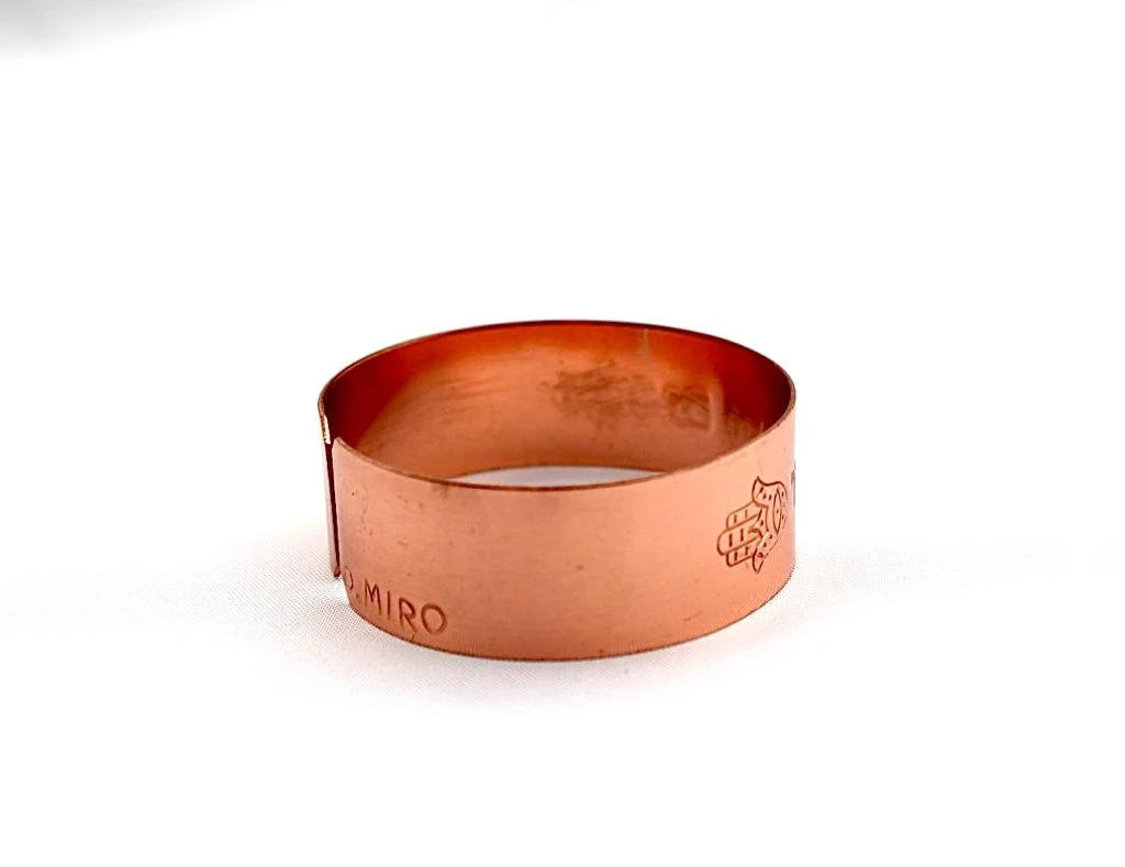 copper bracelet engraved :"This too shall pass" in Hebrew