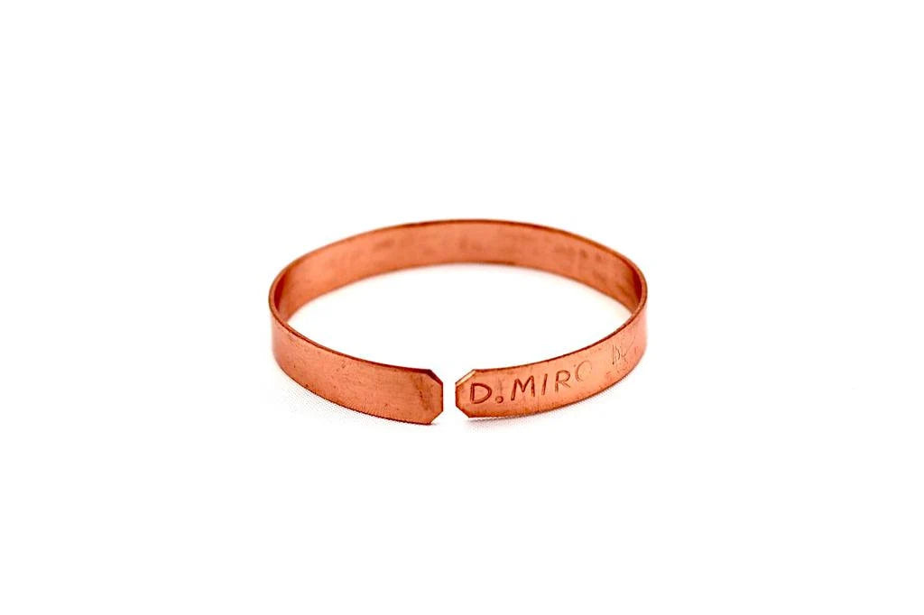 copper bracelet engraved : "Depart from evil, and do good" in Hebrew