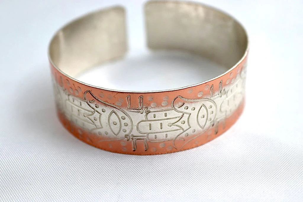 copper bracelet with Hamsa and the word Hay (Life)