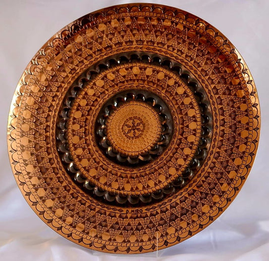 Unique handmade copper hammering, circular decorations with blackened copper